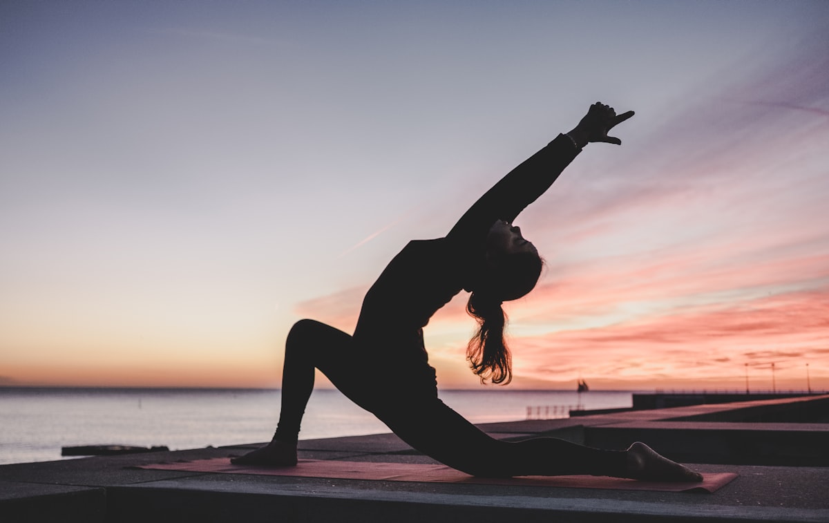 Yoga practitioners in a Malaysian studio practising breathing and meditation